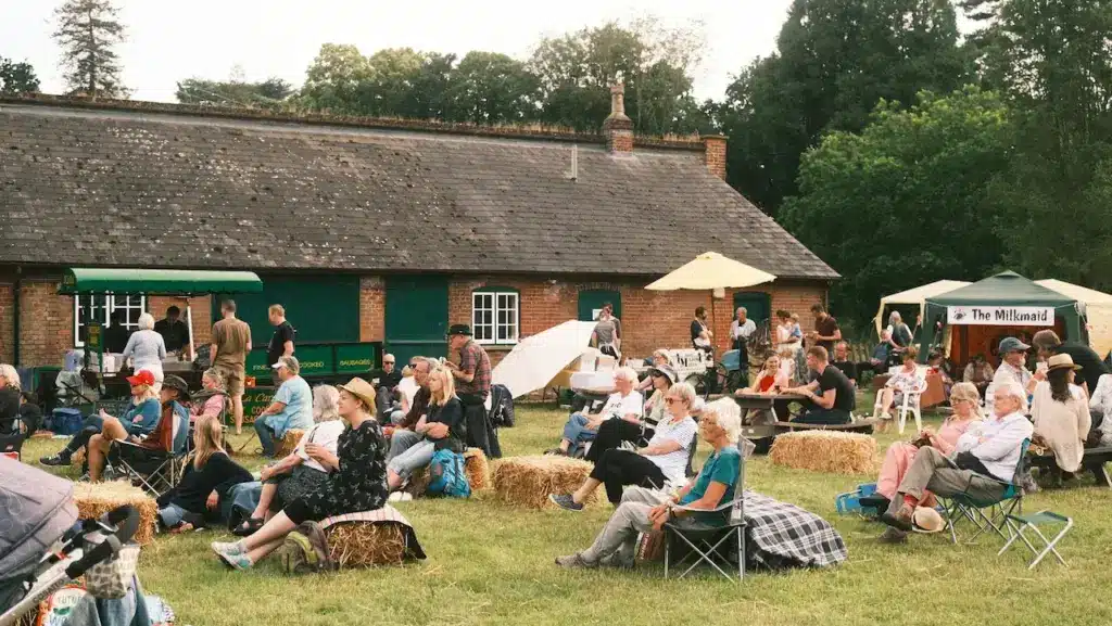 People Sitting in Folk Festival 