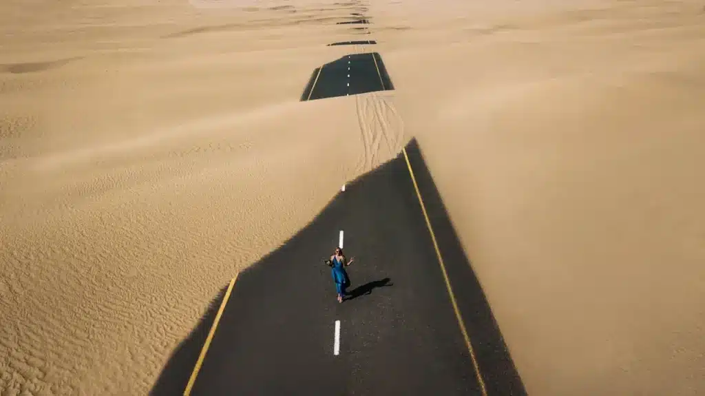 Dubai United Arab Emirates Sand Over Road